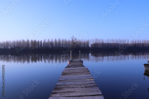 Wooden ski jump on the river © Nikola