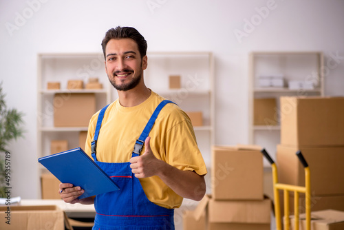 Young male contractor doing home relocation