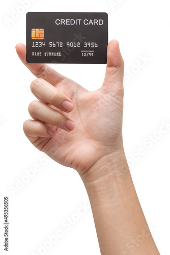 Woman hand holds black credit card isolated on white background.