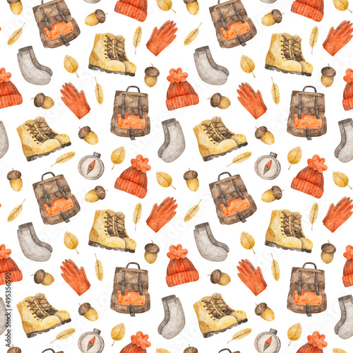 Watercolor seamless pattern with autumn clothes for hiking, yellow leaves and acorns on white background © Katerina Koniukhova