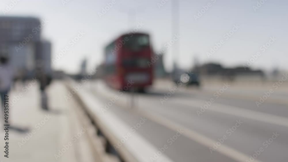 Camera pans across a blurred background of London Bridge Camera pans across a blurred background of London Bridge