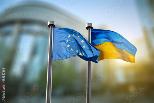Flags of Ukraine and European Union against EU parliament
