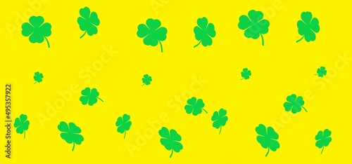 Green leaves on a yellow background.