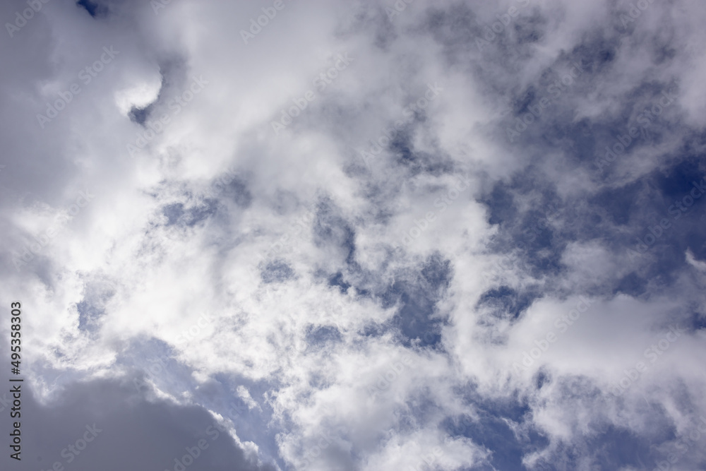 Clouds on a dark sky in spring (copy space). Clouds on a dark sky in spring (copy space).