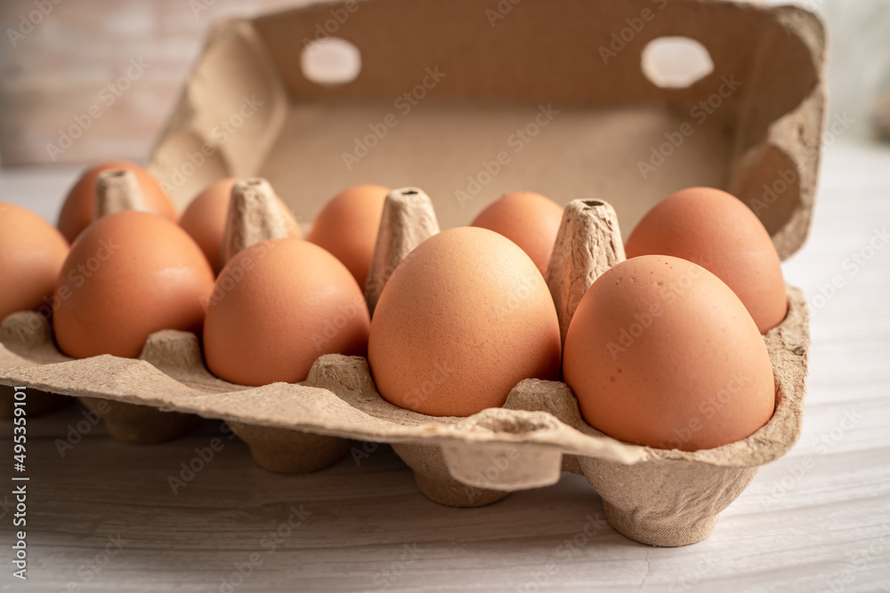 Organic fresh eggs in cardboard container pack, organic healthy food. Organic fresh eggs in cardboard container pack, organic healthy food.