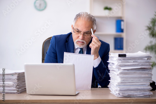 Old male employee and too much work in the office