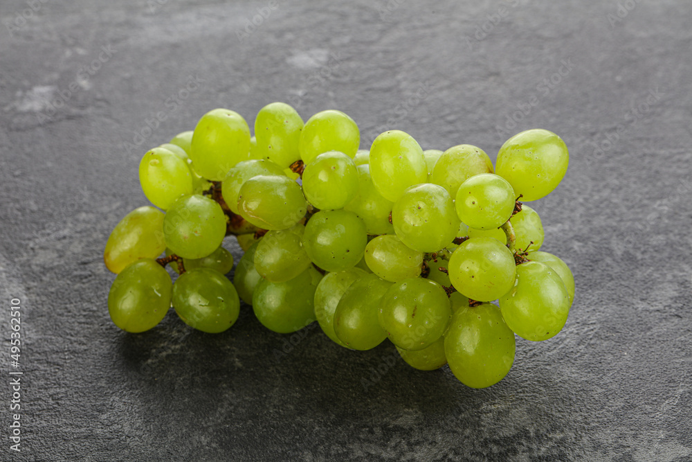 Ripe sweet green grape branch