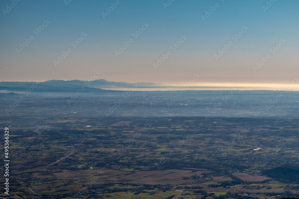 The plain and the sea from the alpine peak