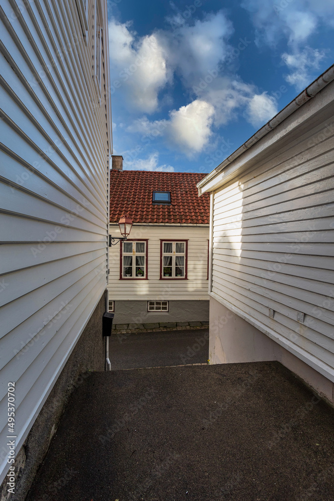 Fototapeta premium .Two white wooden windows at the end of the stairs. Concept of travel. Norway.2021.