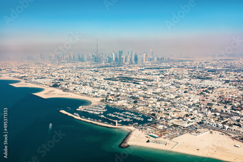Dubai aerial view of coast and downtown with Burj Khalifa