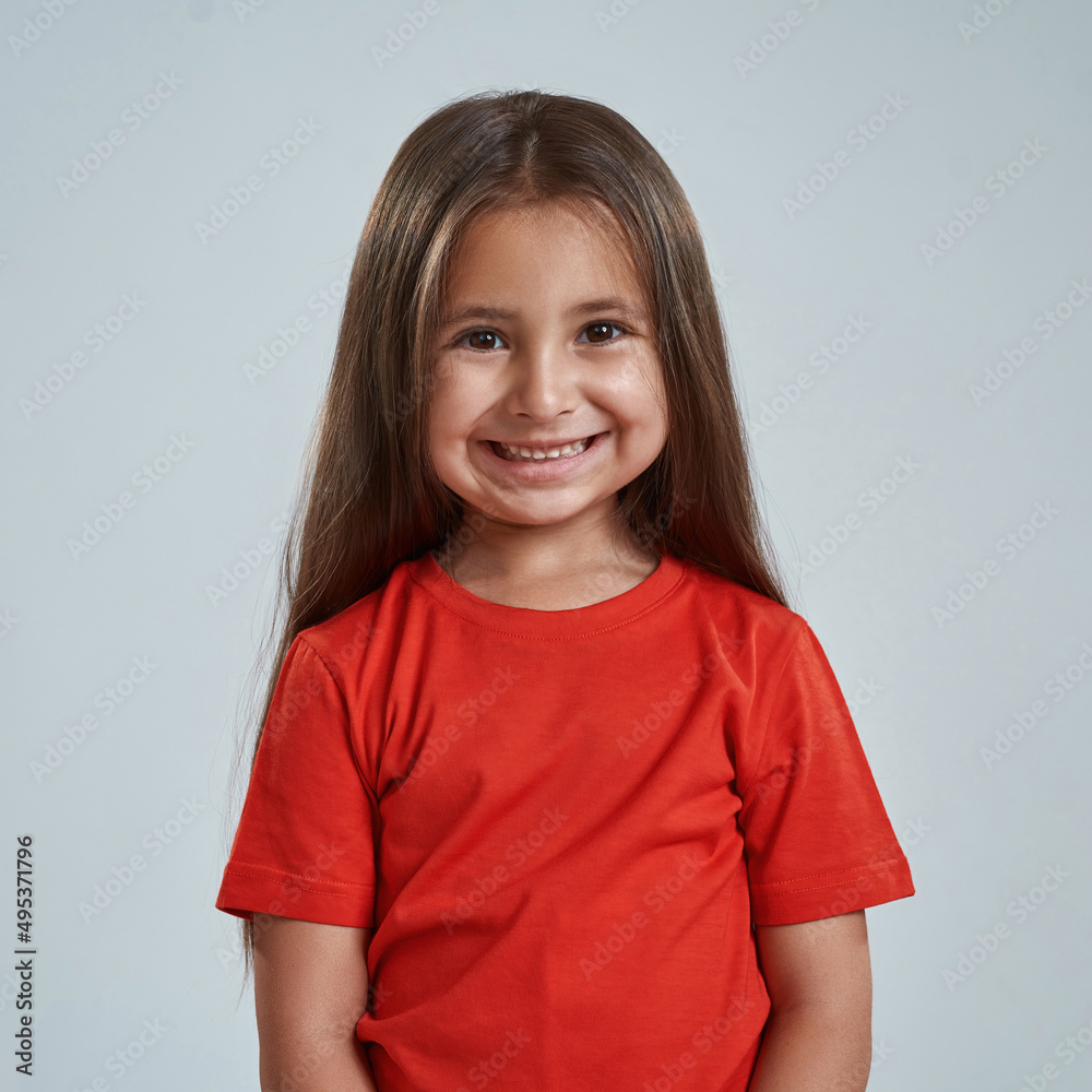 Front view of beautiful little girl look at camera Front view of beautiful little girl look at camera