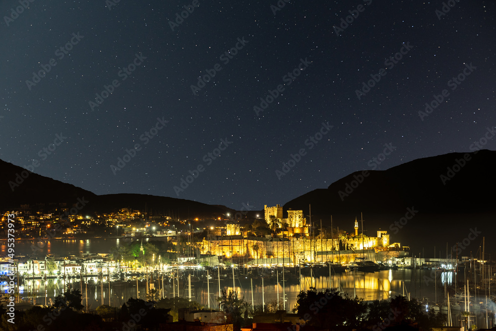 Close up photo of bodrum castle with nightscape.