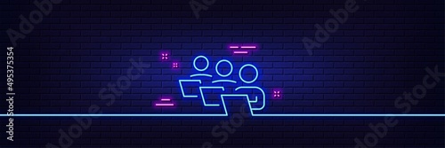 Neon light glow effect. Teamwork line icon. Remote office sign. Team employees symbol. 3d line neon glow icon. Brick wall banner. Teamwork outline. Vector
