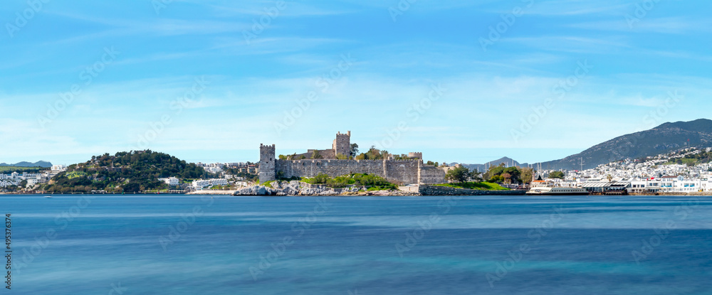 Long exposure photo of Bodrum castle on sunny day. Tourism and leisure concept.