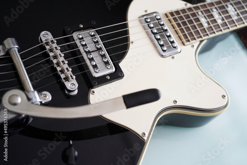 detail photo of an black electric guitar