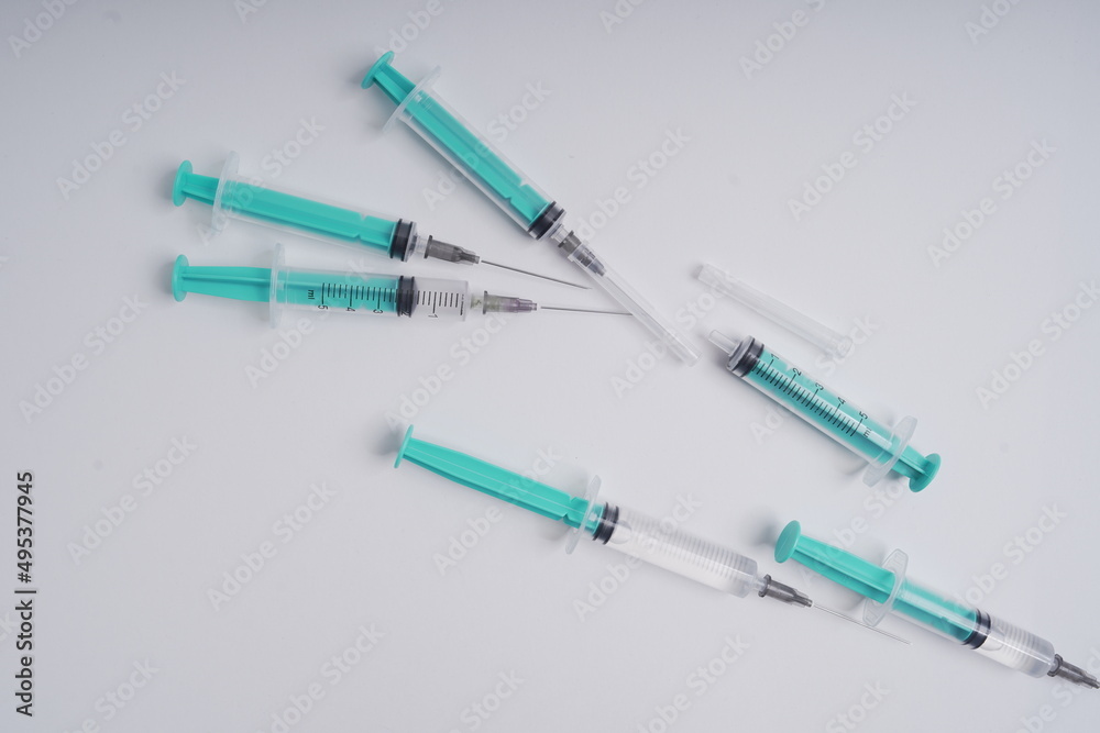 medical disposable injection syringe on a white background