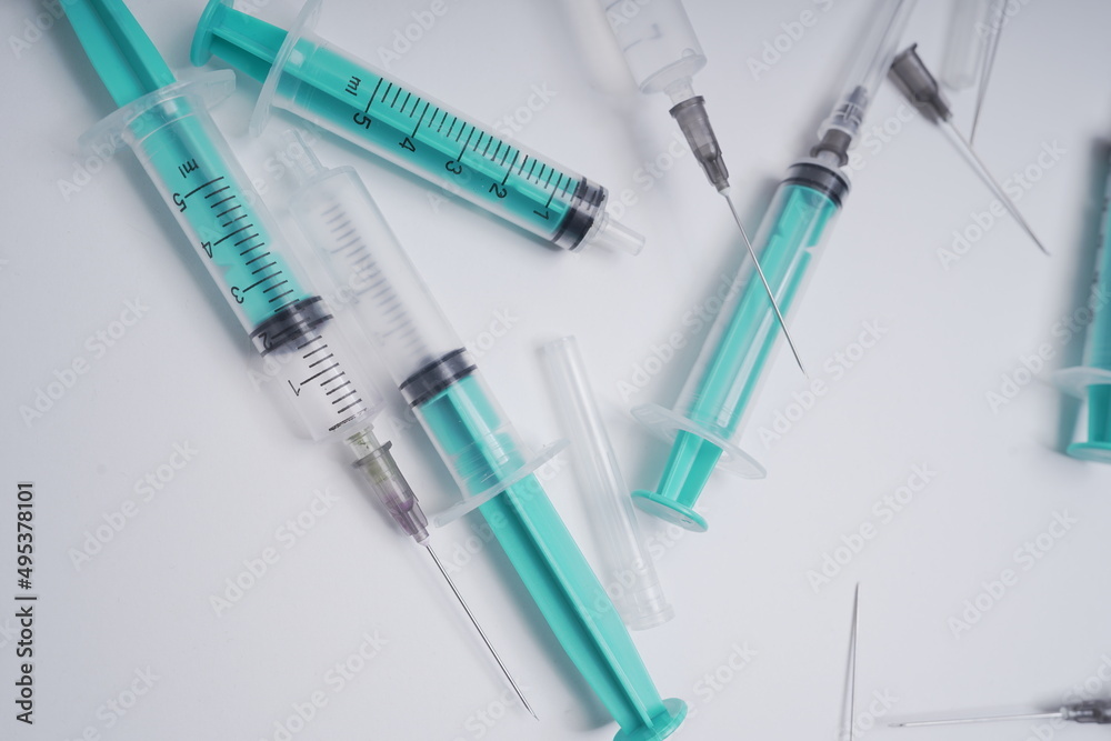 medical disposable injection syringe on a white background medical disposable injection syringe on a white background