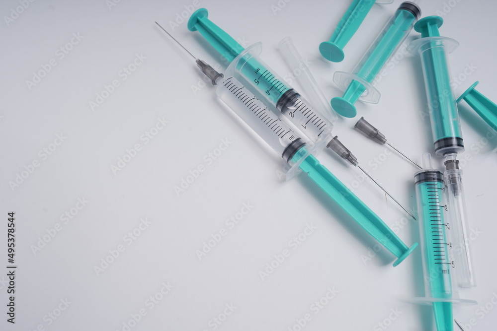 medical disposable injection syringe on a white background medical disposable injection syringe on a white background