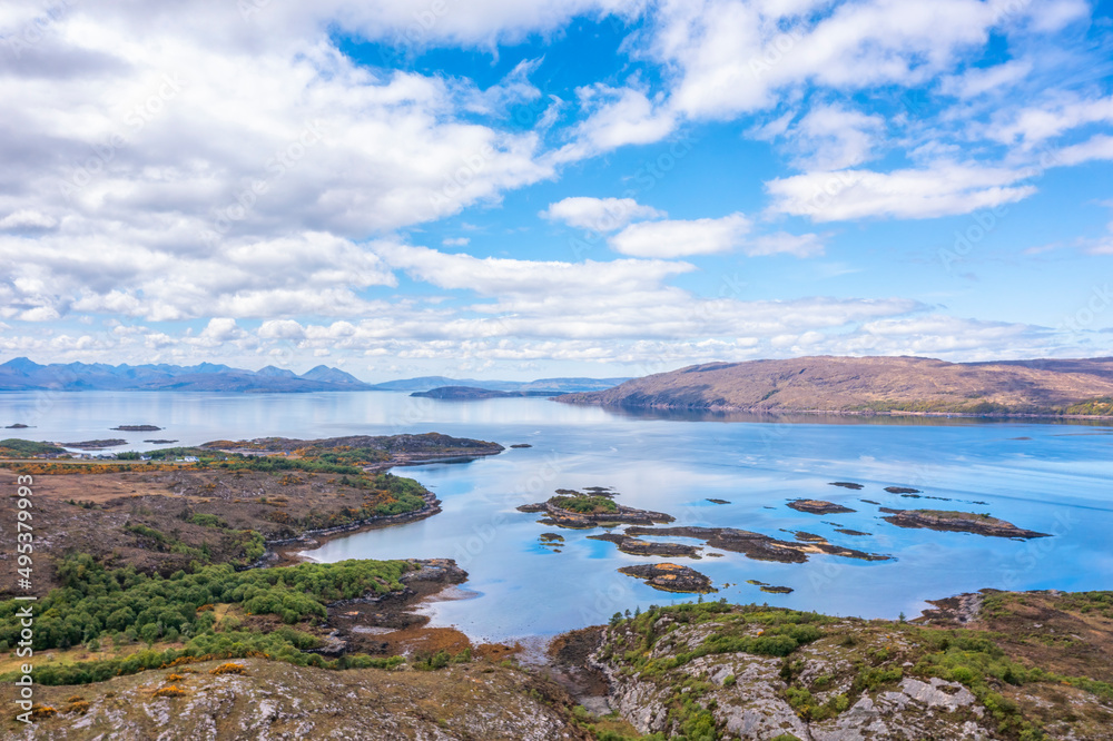 Scenic view of lake under cloudy sky Scenic view of lake under cloudy sky