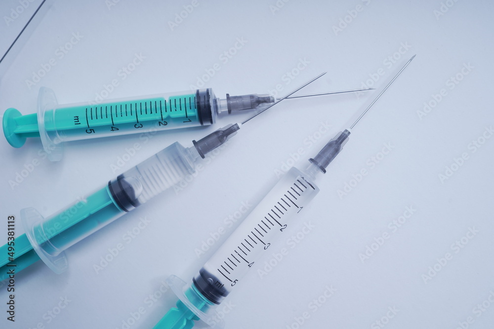 medical disposable injection syringe on a white background medical disposable injection syringe on a white background