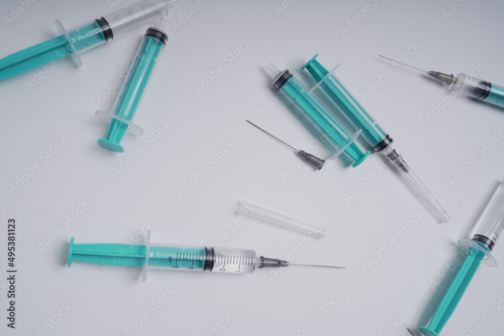 medical disposable injection syringe on a white background medical disposable injection syringe on a white background