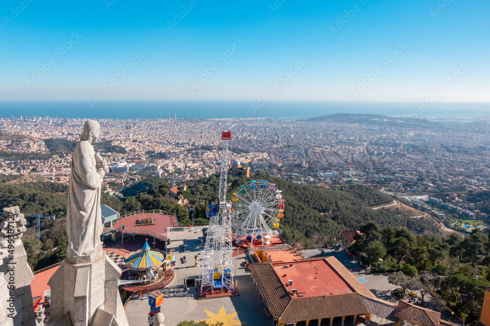 Aerial view (panoramic or landscape) of Barcelona (Catalonia, Spain) from the highest point of the Tibidabo mountain and amusement park