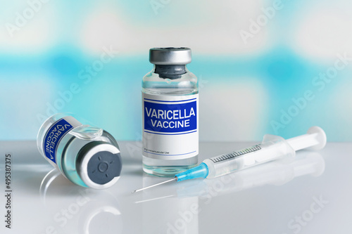 Two vials with vaccine doses for chickenpox Varicella virus disease. Vaccination for booster shot for Varicella virus or Varicella Zoster VZV in Children photo
