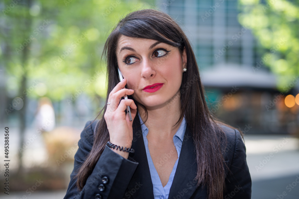 Businesswoman talking on the phone Businesswoman talking on the phone