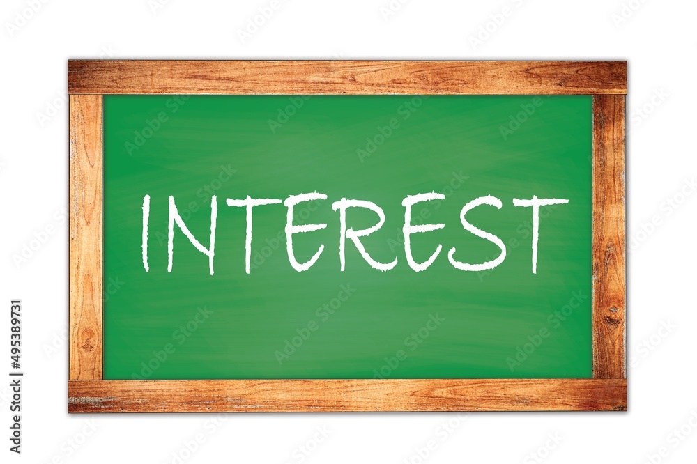 INTEREST text written on green school board. INTEREST text written on green school board.