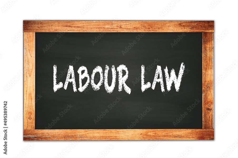 LABOUR LAW text written on wooden frame school blackboard. LABOUR LAW text written on wooden frame school blackboard.