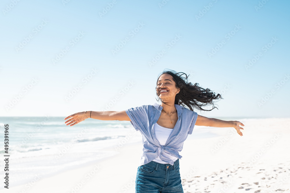 Carefree smiling woman enjoy the summer at beach Carefree smiling woman enjoy the summer at beach