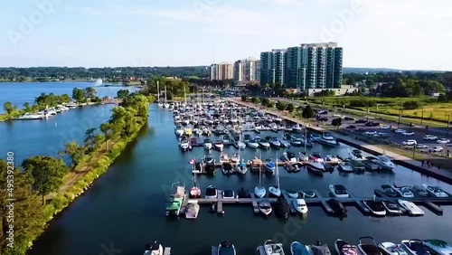 Downtown Barrie, Ontario Marina Boat Docks with Waterfront Beach Condos Under Blue Sunny Summer Skies photo