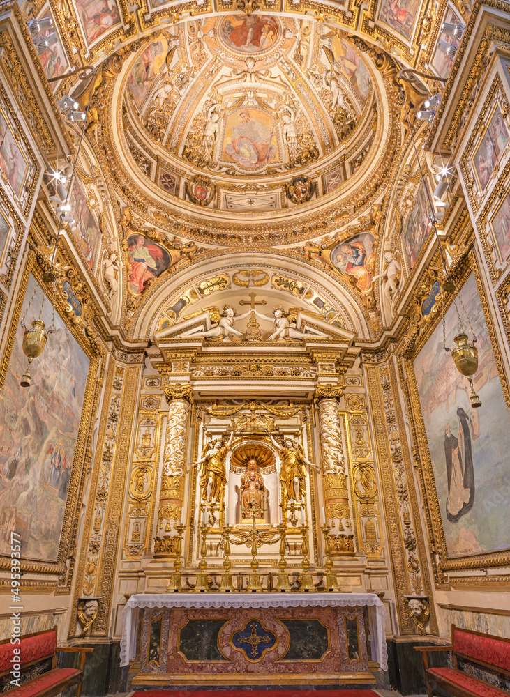 ROME, ITALY - SEPTEMBER 1, 2021: The side chapel of Santa Maria in Monserato in the same name church and central Madonna statue by Manuel Martí Cabrer from 20. cent.