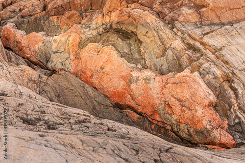 Close up of the texture of a pink pegmatite dyke at the coast of the Barents sea in the vicinity of Grense Jakobselv, Finnmark, Norway