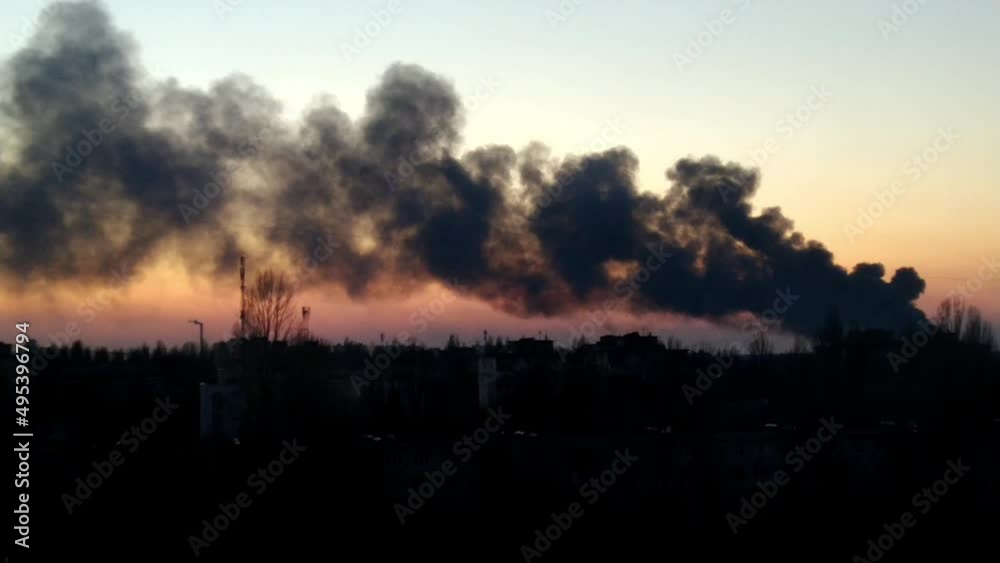 A civilian residential building in Kyiv, Ukraine, burns and smokes heavily after being bombed by Russian missiles during the war and the Russian attack on Ukraine. Smoke and fire. March 2022. A civilian residential building in Kyiv, Ukraine, burns and smokes heavily after being bombed by Russian missiles during the war and the Russian attack on Ukraine. Smoke and fire. March 2022.