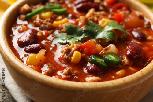 Bowl with tasty chili con carne, closeup view