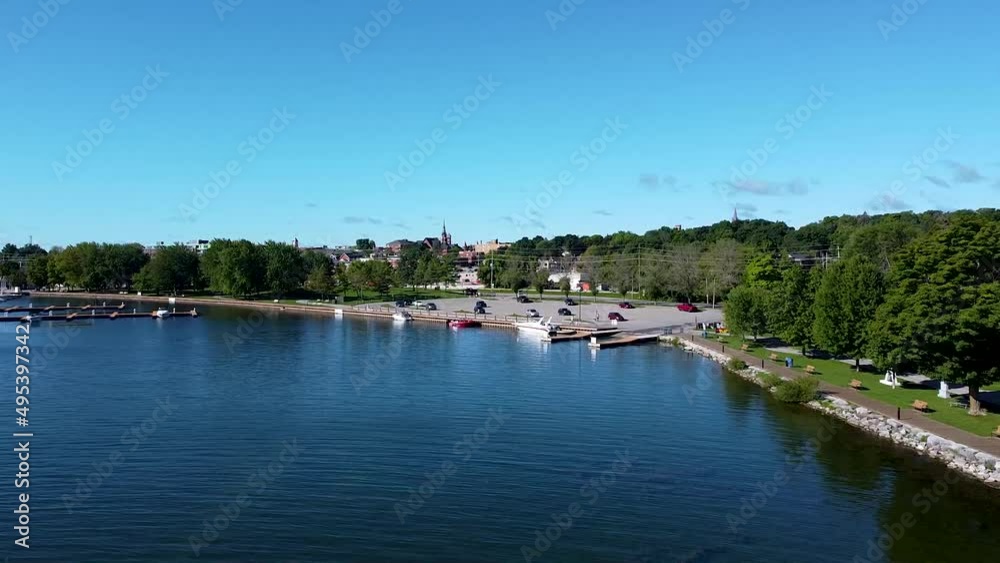 Waterfront In Orillia, Ontario. Drone flyover with Bird fly by. Summer beautiful scenic Marina Waterfront In Orillia, Ontario. Drone flyover with Bird fly by. Summer beautiful scenic Marina