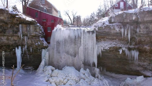 Large Frozen Waterfall with Historic Grain Mill Niagara Escarpment Decew Falls St. Catherines Ontario photo