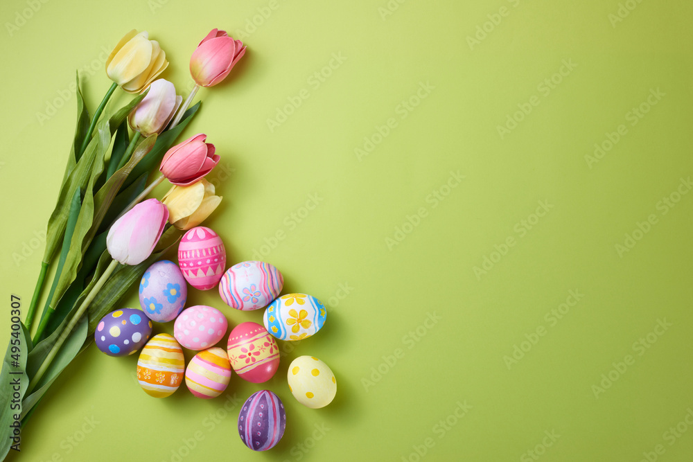 Happy Easter day colorful eggs and flower on paper background with copy space