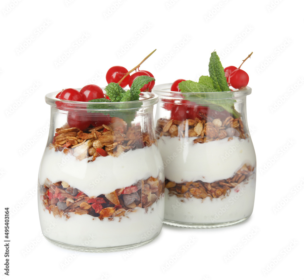 Delicious yogurt parfait with fresh red currants and mint on white background Delicious yogurt parfait with fresh red currants and mint on white background