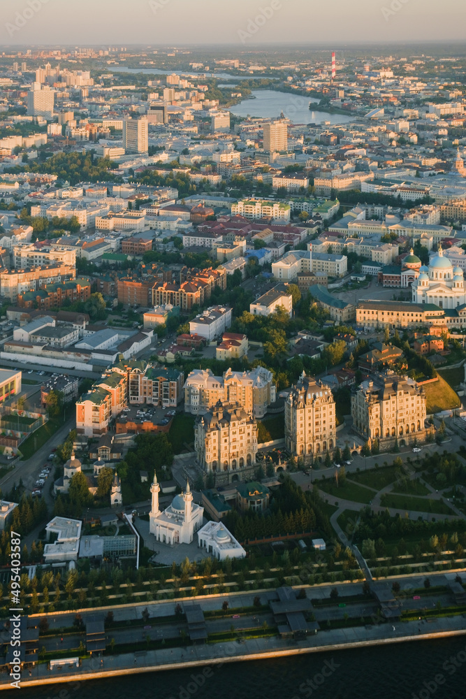 Panoramic summer shot from above of Kazan city. Capital of the Tatarstan, Russia. City centre and landmark. Residential buildings and attractions. Kazanka river, Bauman street, cars, hotels. Torism. 