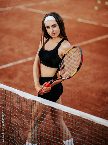 Wallpaper Mural 
The girl tennis player plays sports on the tennis court Torontodigital.ca
