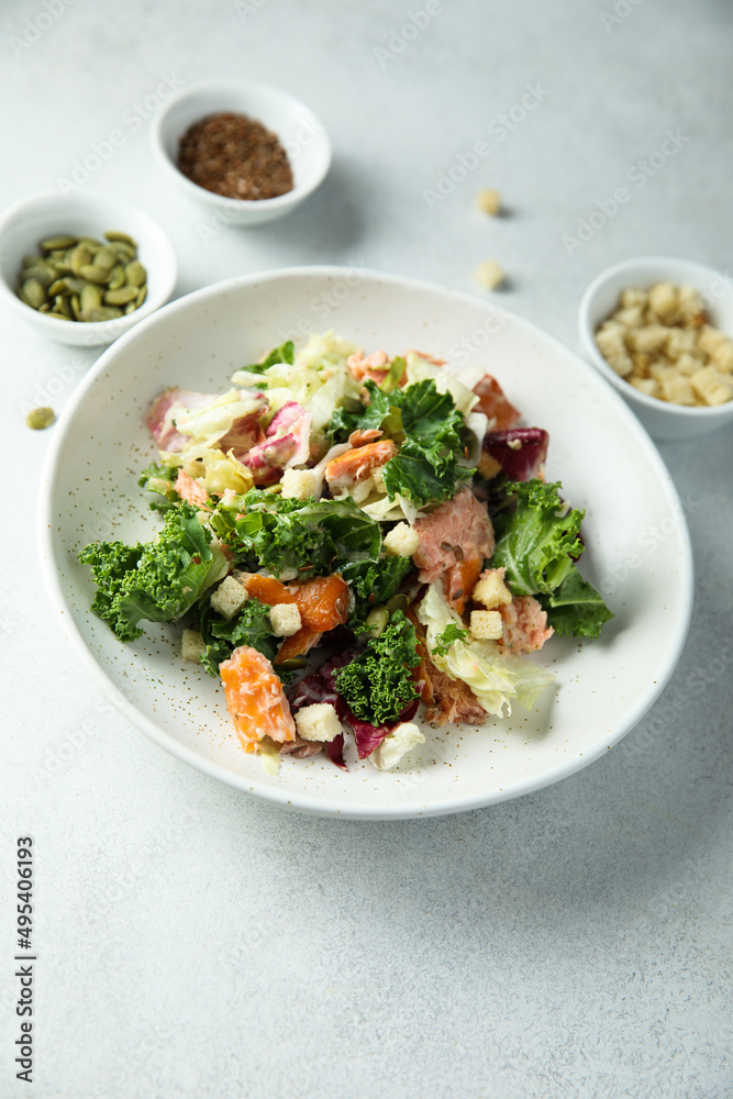 Kale salad with hot smoked salmon