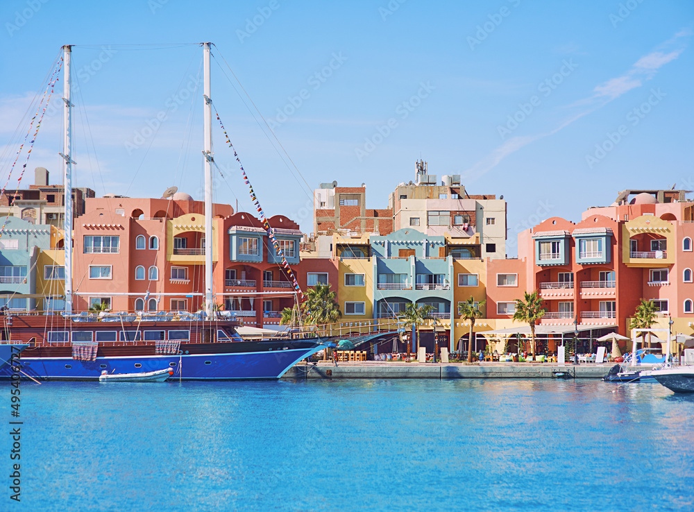 yachts and boats in the port town by the sea in summer. Travel, recreation, environment concept
