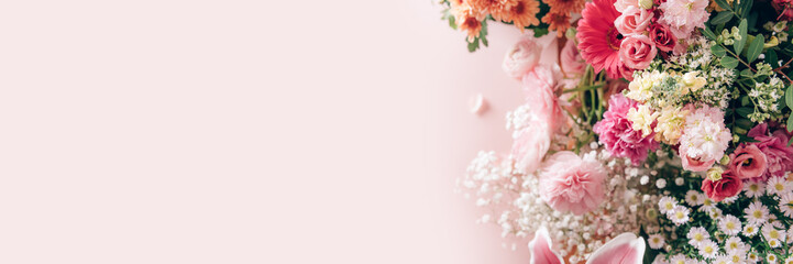 Different kinds of summer flowers such as ranunculus, lilies, peonies, chrysanthemums, gypsophila, carnations, lisianthus. Many flower bouquets after birthday party