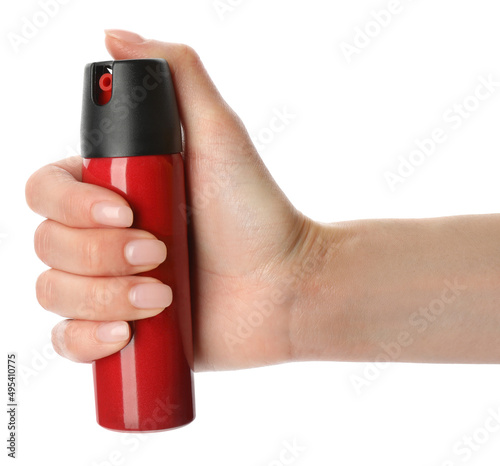 Woman with bottle of gas pepper spray on white background photo