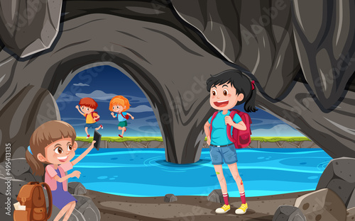 In cave scene with children exploring cartoon character