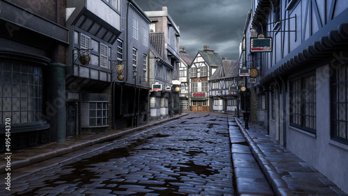 Canvas-taulu Old Victorian street with cobblestones in a town or city under grey cloudy sky