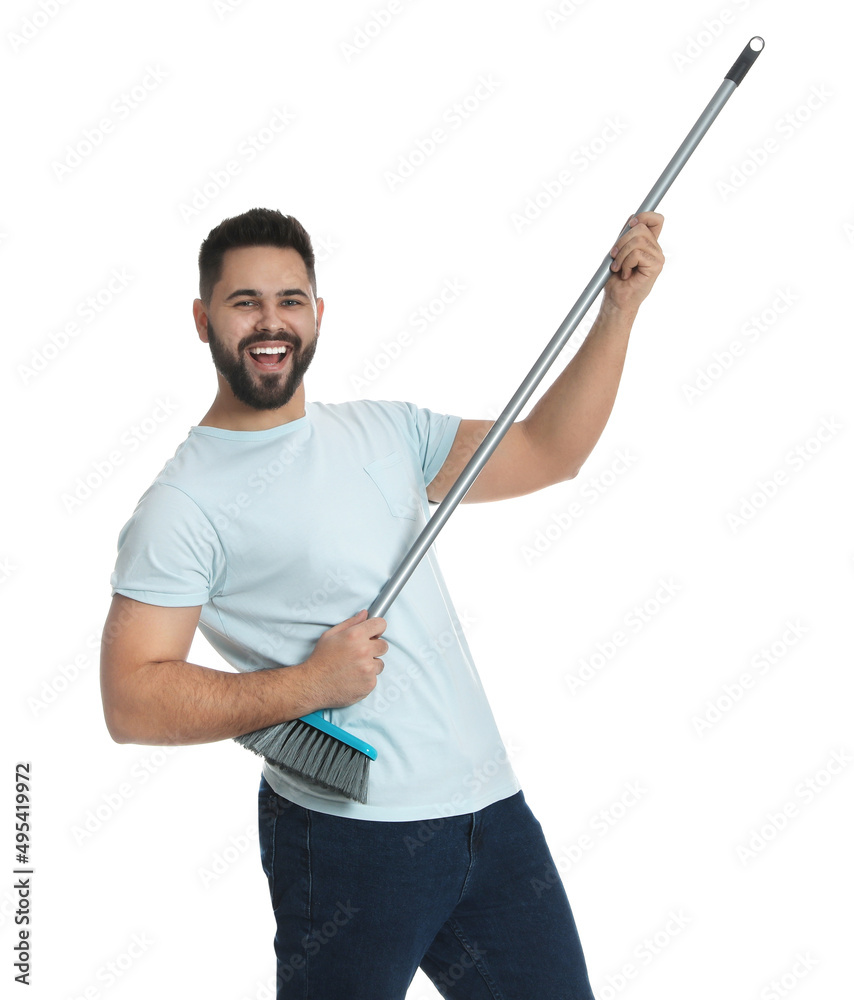 Young man with broom on white background Young man with broom on white background