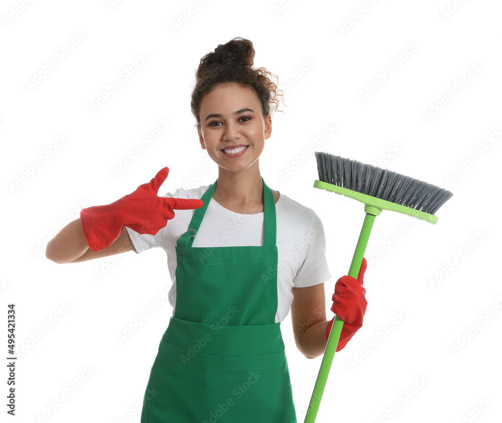 African American woman with green broom on white background African American woman with green broom on white background